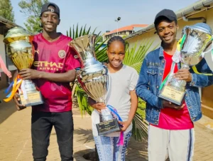 Students possing with trophies